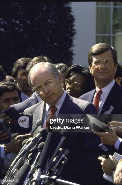 Representative Richard E. Cheney and Representative Chester T. "Trent" Lott talking to reporters after meeting with President Ronald with Reagan at...