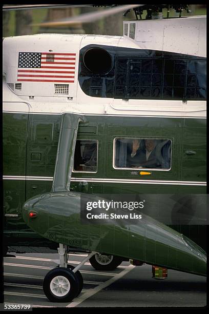 President Reagan waving from window of Marine One helicopter as he & Nancy leave from WH after 8 yrs. In office.