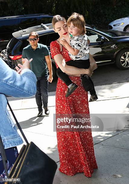 Actress Jaime King with he Son James Knight Newman attend the launch of "Bottle And Heels" charity event on May 22, 2016 in Los Angeles, California.