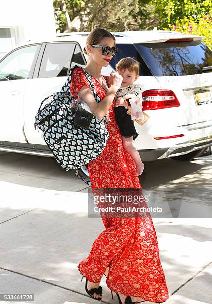 Actress Jaime King with he Son James Knight Newman attend the launch of "Bottle And Heels" charity event on May 22, 2016 in Los Angeles, California.
