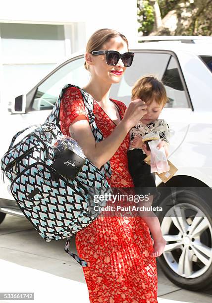 Actress Jaime King with he Son James Knight Newman attend the launch of "Bottle And Heels" charity event on May 22, 2016 in Los Angeles, California.