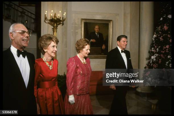 President & Nancy Reagan with British PM Margaret & Denis Thatcher during State Dinner.