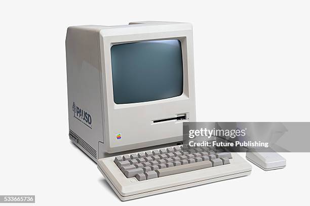 Vintage 1980's Apple Macintosh personal computer with keyboard and mouse, taken on May 21, 2009.