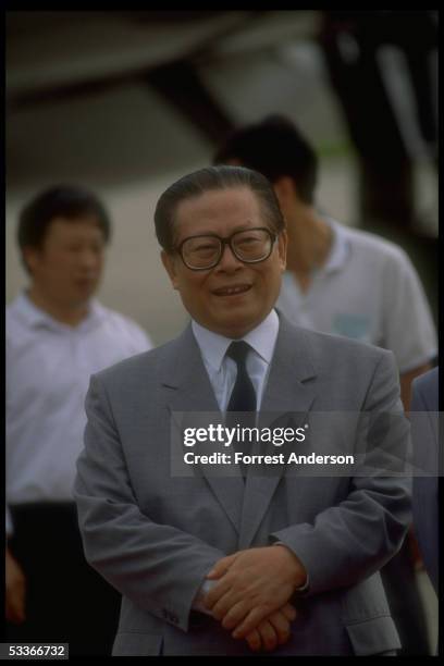 Communist Party chief Jiang Zemin during outdoor event.