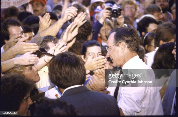 Vice President George Bush on the campaign trail surounded by crowd of supporters at Western Kentucky University