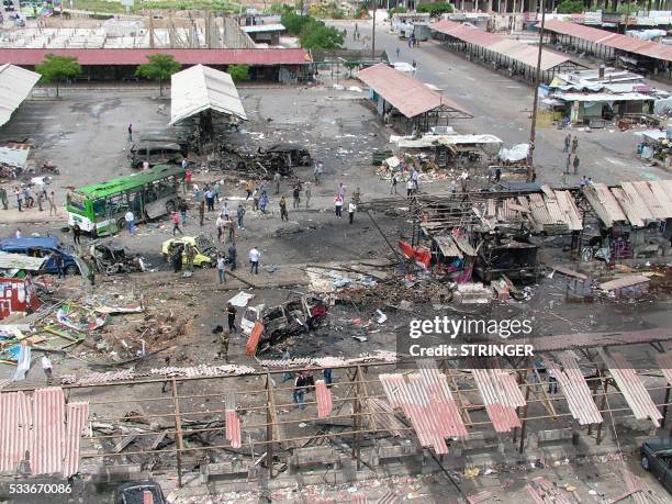 General view shows a bus station that was targetted as part of multiple bombings that left tens dead in the northern coastal city of Jableh, between...