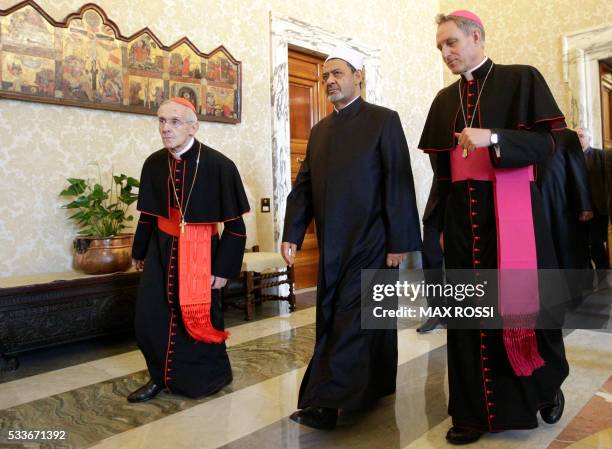 Egyptian Grand Imam of al-Azhar Mosque Sheikh Ahmed Mohamed al-Tayeb arrives with archbishop Georg Gaenswein and cardinal Jean-Louis Tauran to meet...