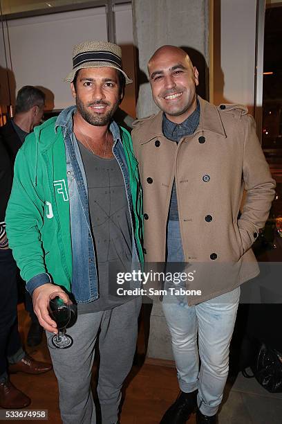 Alex Dimitriades and Friend attend the Eat'aliano by Pino Italian Feast launch on May 23, 2016 in Melbourne, Australia.