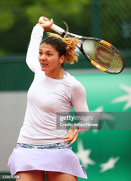 Margarita Gasparyan of Russia plays a backhand during the Ladies Singles first round match against Sloane Stephens of the United States on day two of...