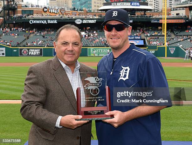 Detroit Tigers Executive Vice President of Baseball Operations and General Manager Al Avila presents Jordan Zimmermann with his American League...