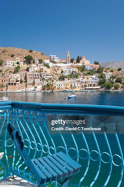 view over the harbour, gialos, symi, greece - symi ストックフォトと画像