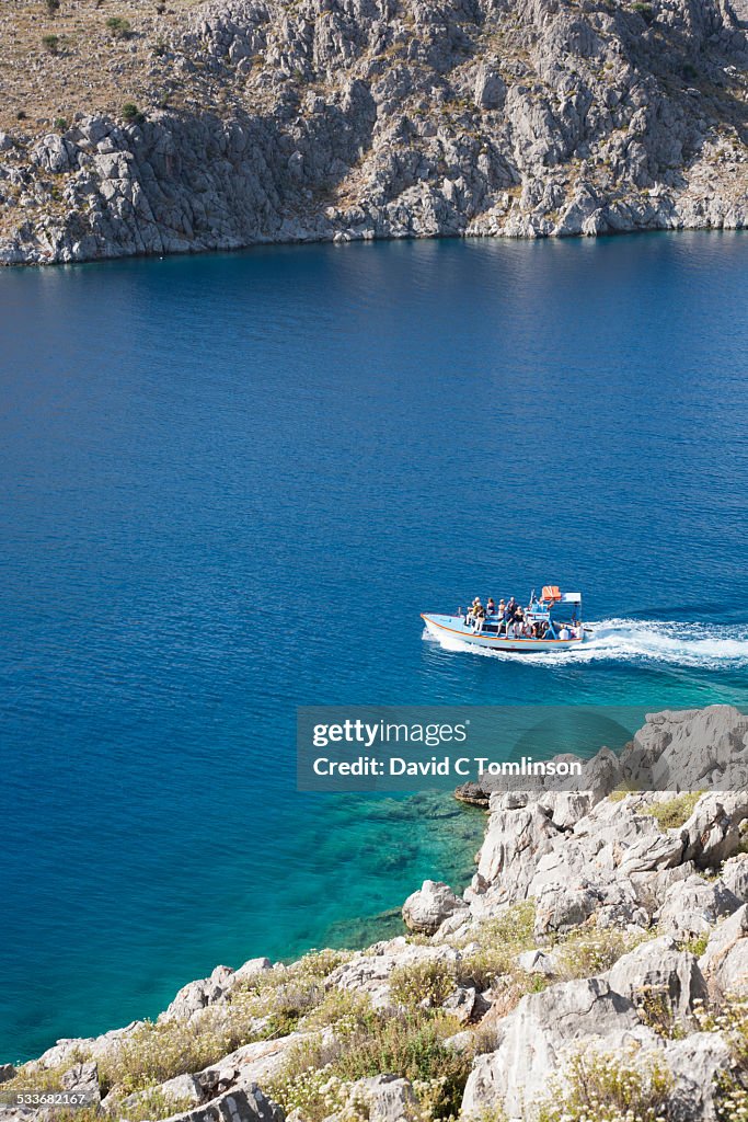 Water taxi crossing Pedi Bay, Pedi, Symi, Greece