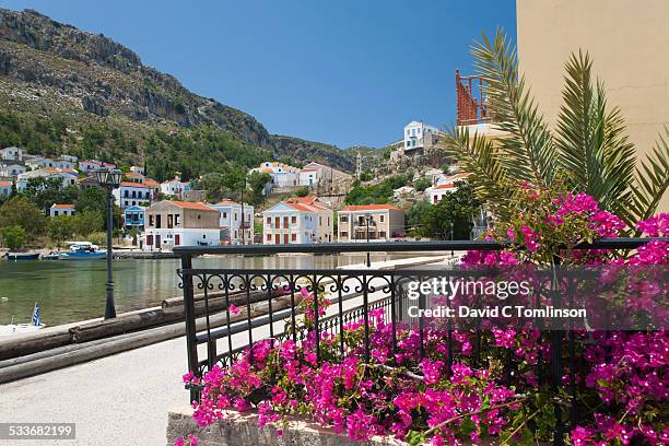 the harbour, mandraki, kastellorizo, greece - greek island stock pictures, royalty-free photos & images