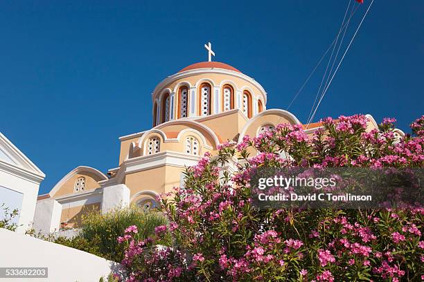 greek orthodox church, gialos, symi, greece - symi stock pictures, royalty-free photos & images