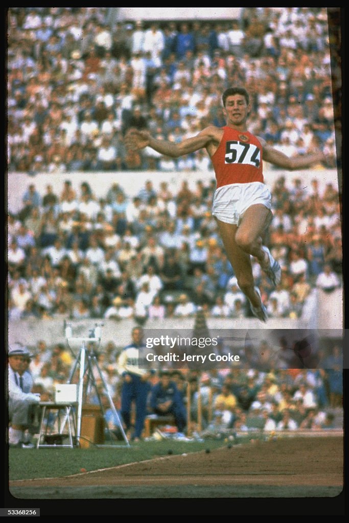 Soviet long jumper Igor Ter-Ovanesyan leaping thro