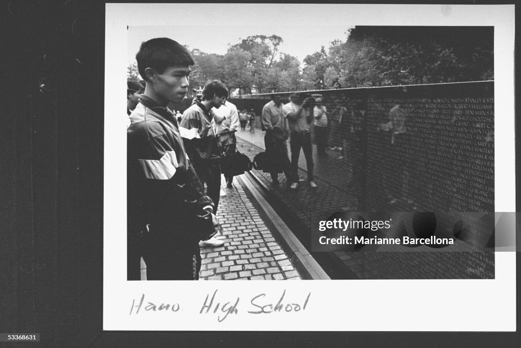 Nguyen Anh Tuan (L), a Hanoi HS soccer player, sta