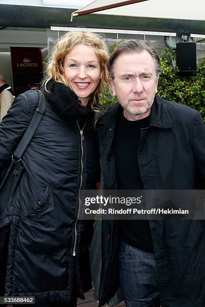 Actor Tim Roth and his wife Nikki Butler attend the 2016 French Tennis Open - Day Two at Roland Garros on May 23, 2016 in Paris, France.