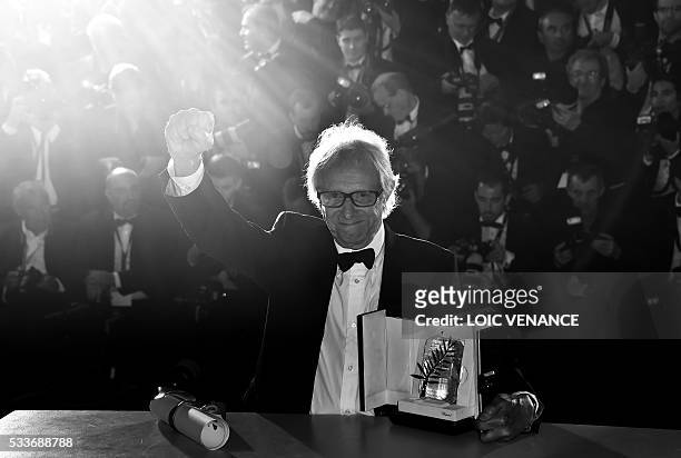 British director Ken Loach poses with his trophy on May 22, 2016 during a photocall after winning the Palme d'Or for the film "I, Daniel Blake" at...
