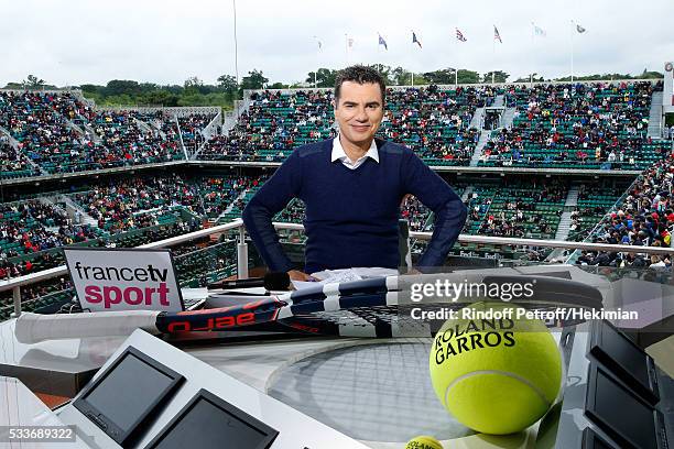 Sports journalist Laurent Luyat poses at France Television french chanel studio during the 2016 French Tennis Open - Day Two at Roland Garros on May...