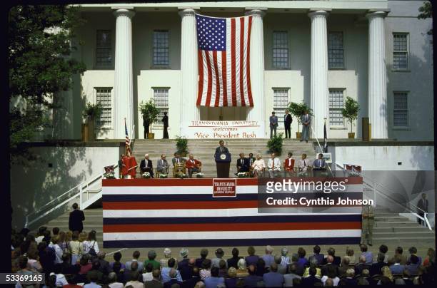 Vice President George Bush speaking at ground breaking ceremony for library addition at Transylvania University, with wife Barbara and ex-governor...