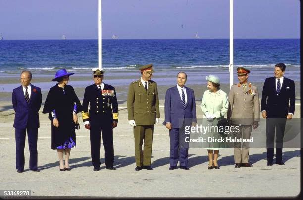 At the 40th anniversary commemoration of D-Day, world leaders pose on Omaha Beach, Normandy, France, June 6, 1984. Pictured are, from left, Canadian...