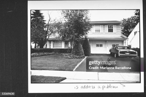 Car parked in front of garage outside two-story home owned by Elliot Fisher, father of 16-yr-old Amy Fisher, who shot Mary Jo Buttafuoco in the head...