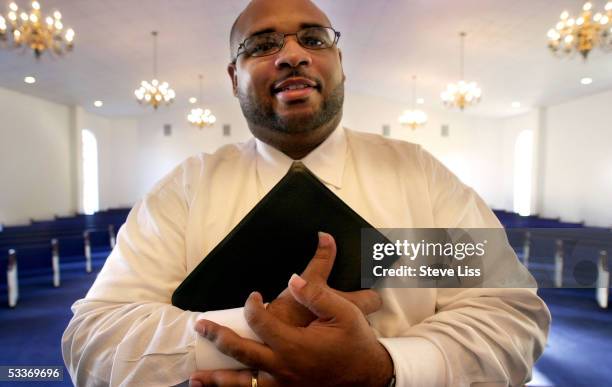 Rev. Edward Cook, associate pastor and director of the daycare center at the Greater New Jerusalem Missionary Baptist Church, a former Junior ROTC...