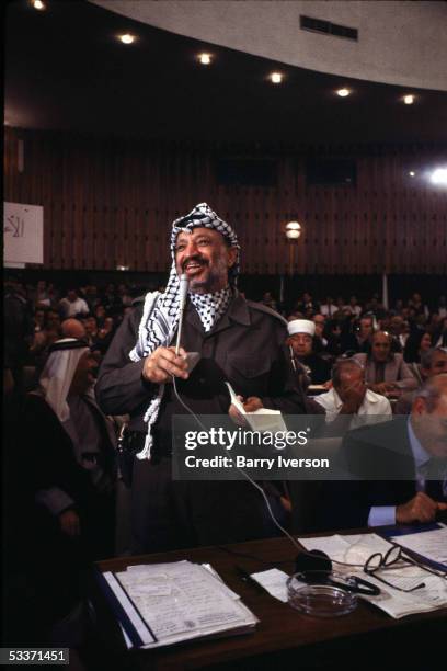 Palestine Liberation Organization leader Yasser Arafat speaking during a meeting of the Palestinian National Council.