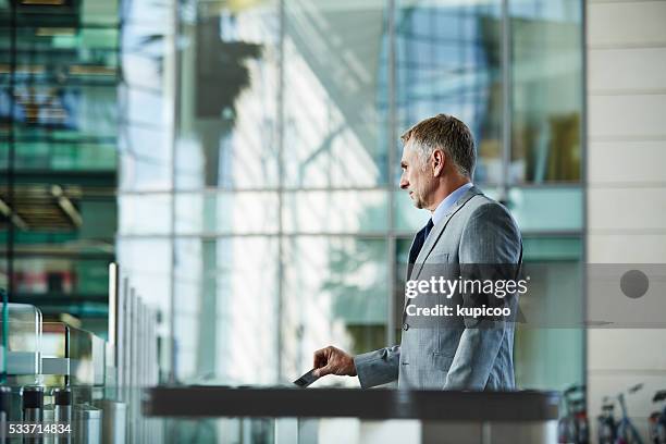 Man In Building 2,150 Man In Building Lobby Stock Photos, High-Res Pictures, and Images ...