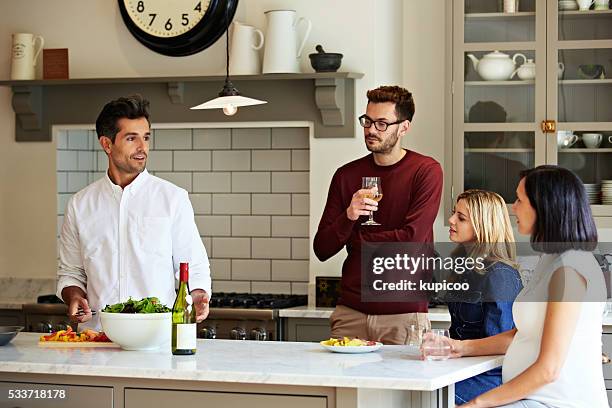 the beginning of a great dinner party - people speaking great background stockfoto's en -beelden