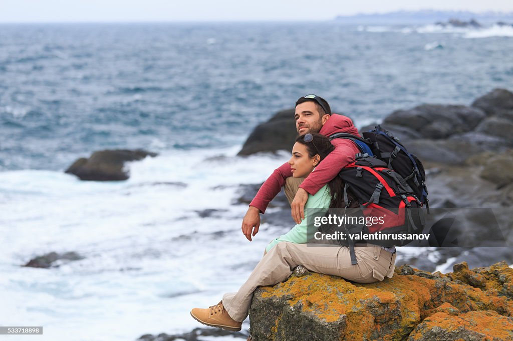 Embrace on rocks