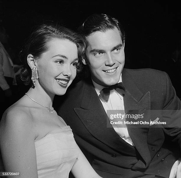 Actress Barbara Rush and husband Jeffrey Hunter attend a movie premiere of "Prince Valiant" at Romanoff's in Los Angeles,CA.