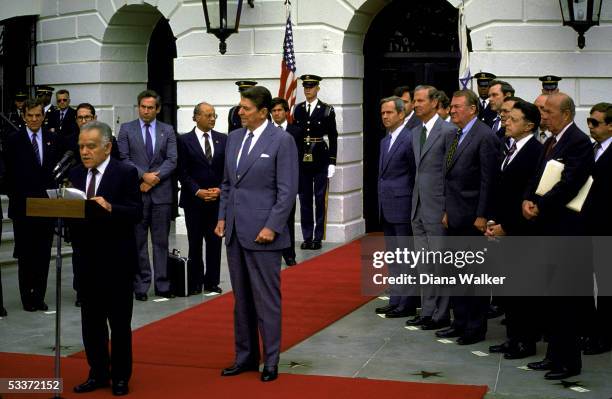 President Reagan with Israeli Prime Minister Shamir at departure ceremony. Right front row, L to R, NSC Advisor McFarlane, White House aides James...