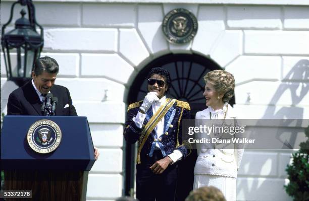 President Reagan and wife Nancy with Michael Jackson at White House.