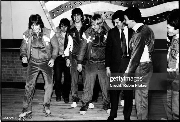 Members of the 1980 Gold medal winning US Olympic hockey team at the Roxy Roller Disco in NYC, Mark Wells, Mark Pavelich, Steve Christoff, Bob Suter,...