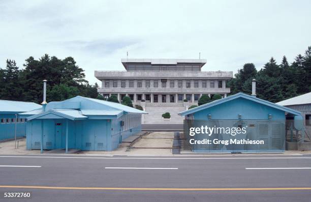 Blue buildings in the UN controlled DMZ, or Demilitarized Zone between North & South Korea where Korean War ceasefire was signed; in background is...