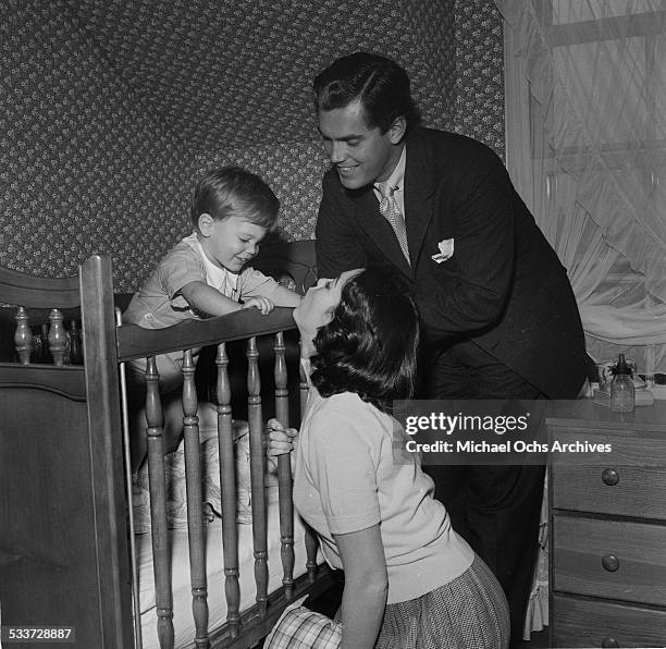 Actress Barbara Rush, husband Jeffrey Hunter and son Christopher pose at home in Los Angeles,CA.