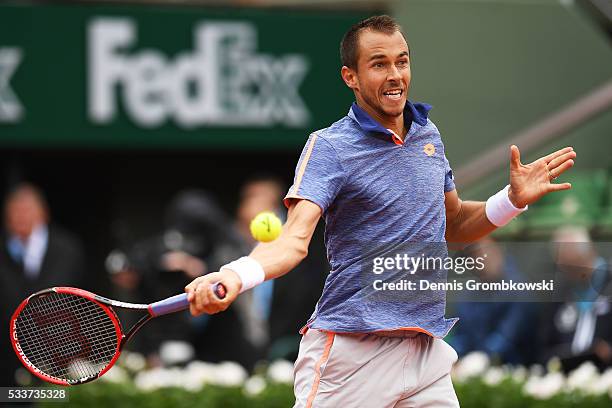 Lukas Rosol of Czech Republic plays a forehand during the Men's Singles first round match against Stan Wawrinka of Switzerland on day two of the 2016...