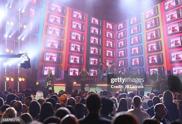 Charlotte Caffey, Belinda Carlisle, Gina Schock, Paula Jean Brown and Jane Wiedlin of The Go-Go's are seen on stage during the 2016 Billboard Music...