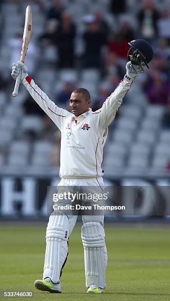 Alviro Petersen of Lancashire celebrates scoring his century during the Specsavers County Championship Division One match between Lancashire and...