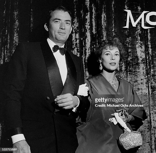 Actor Gregory Peck and his wife Veronique Passani attend the premiere of "Moby Dick" in Los Angeles,CA.