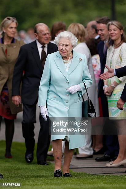 Queen Elizabeth II and her husband Prince Philip, Duke of Edinburgh arrive at Chelsea Flower Show press day at Royal Hospital Chelsea on May 23, 2016...