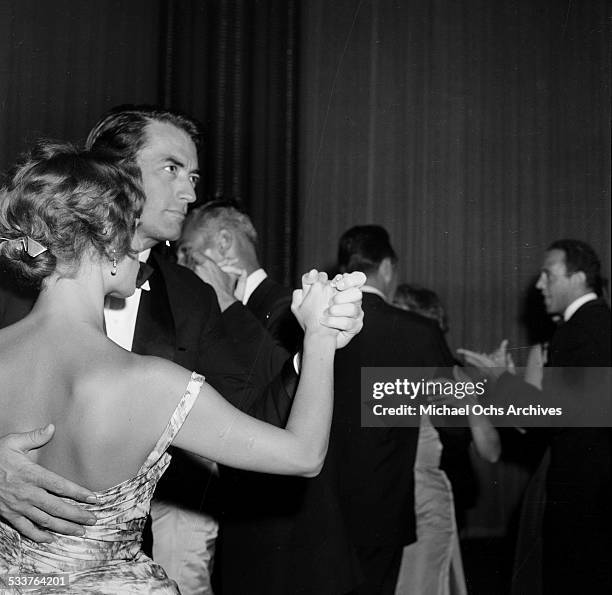 Actor Gregory Peck and his wife Veronique Passani attend the Stanley Kramer Party in Los Angeles,CA.