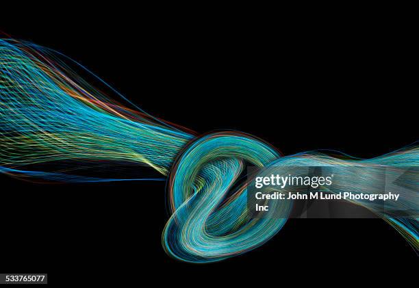 close up of knotted light trails - untie stock pictures, royalty-free photos & images