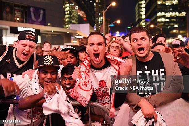 Fans cheer in "Jurassic Park" during game 3 of the NBA Eastern Conference Finals between Cleveland Cavaliers and the Toronto Raptors at Air Canada...