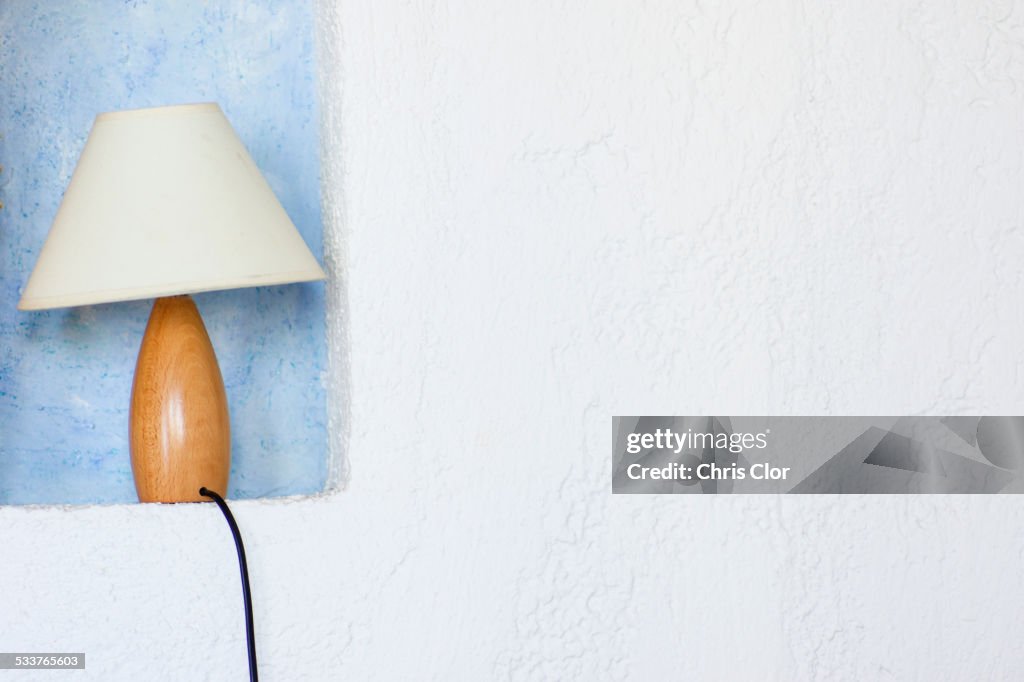 Close up of lamp in wall sconce