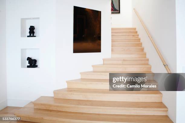 modern staircase and wall art - wooden staircase stock pictures, royalty-free photos & images