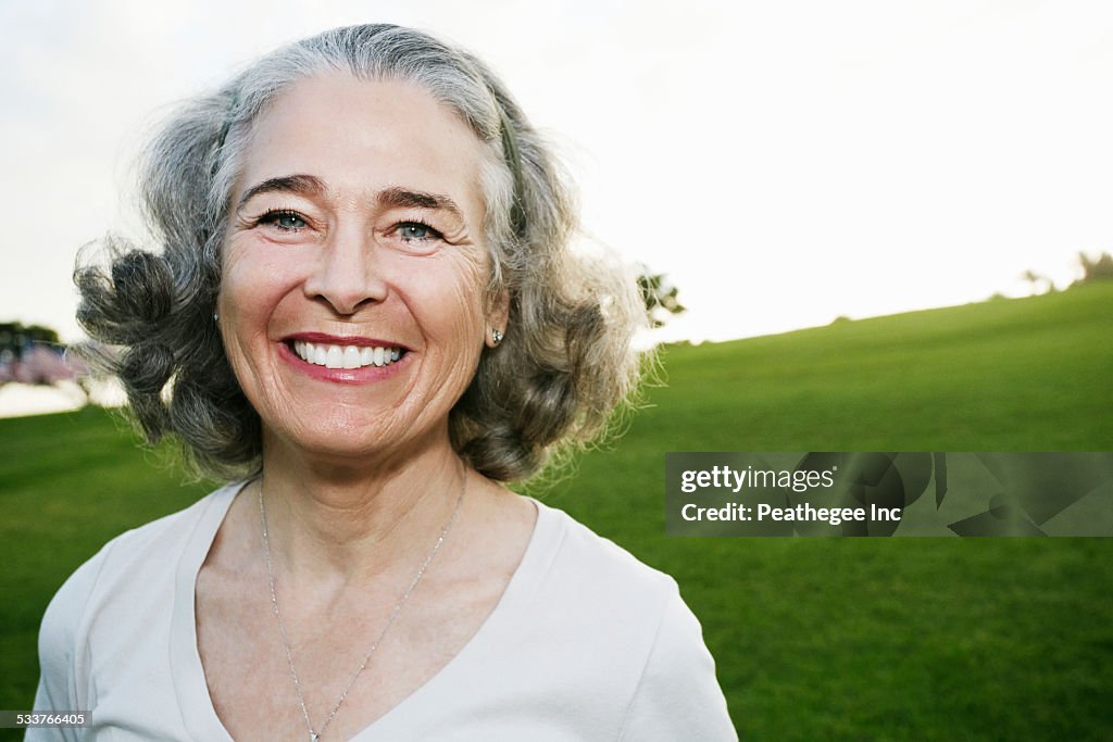 Caucasian woman smiling outdoors