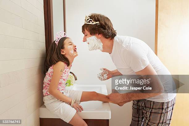 father and daughter playing in bathroom - tiara profile stock pictures, royalty-free photos & images