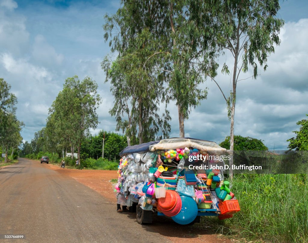 Truck with toys for sale on remote road